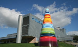 St Mary's Hospital building with some art in the shape of a multicoloured cone outside